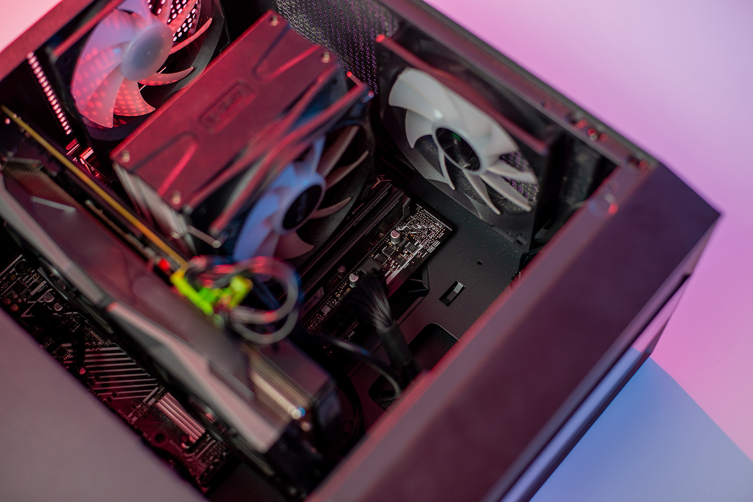 A dusty CPU cooling fan inside of a PC